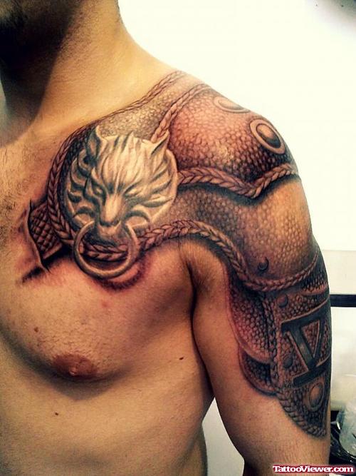 Armor Fantasy Tattoo On Left Shoulder And Chest