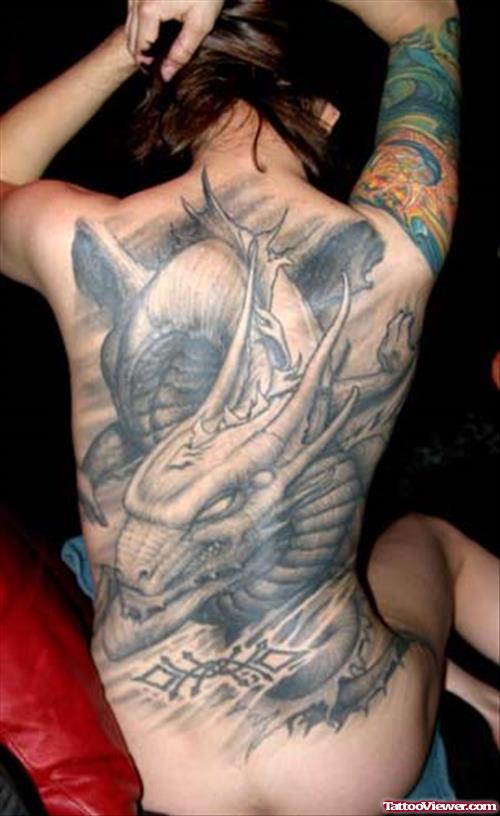 Grey Ink Dragon Fantasy Tattoo On Girl Back Body