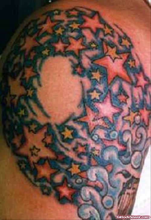 Colored Stars Fantasy Tattoo On Shoulder