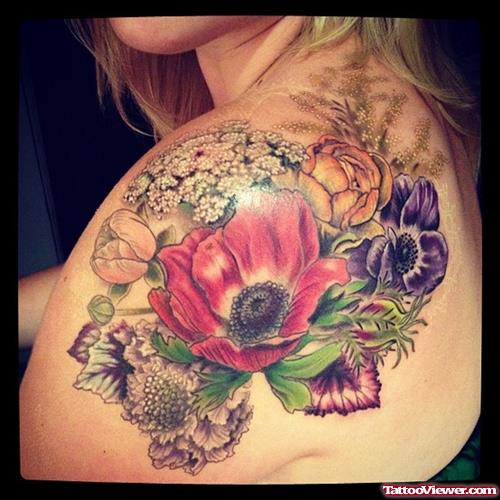 Colored Flowers Fantasy Tattoo On Left Back Shoulder