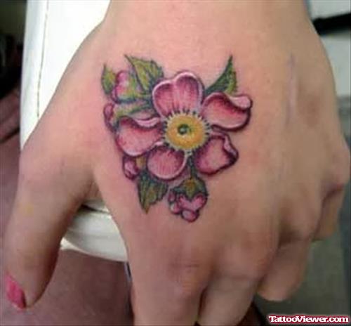 Colored Flower Fantasy Tattoo On Left Hand