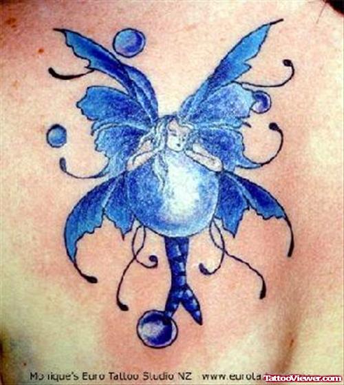 Blue Ink Fantasy Tattoo On Chest