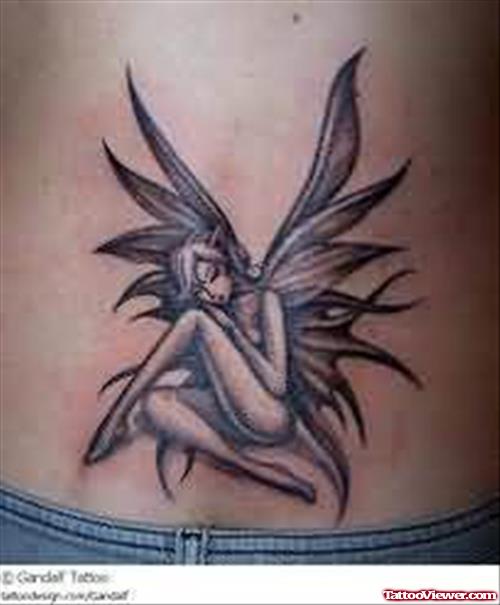 Angel Sitting Fantasy Tattoo