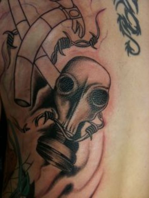 Grey Ink Barbed Wire Skull And Fantasy Tattoo
