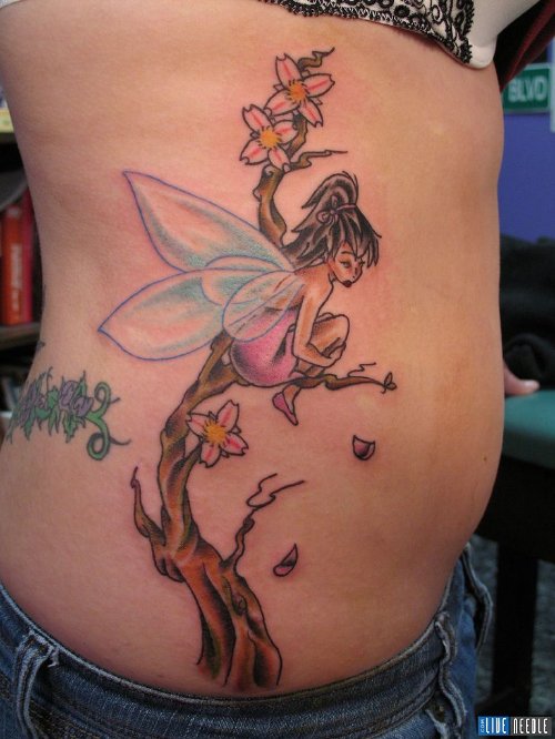 Cherry Blossom Flowers Tree And Fairy Fantasy Tattoo On Side Rib
