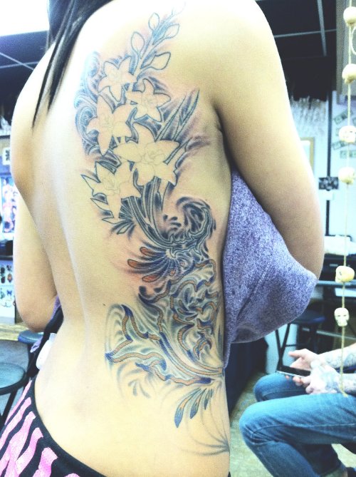Swirls And Flowers Fantasy Tattoo On Side Rib