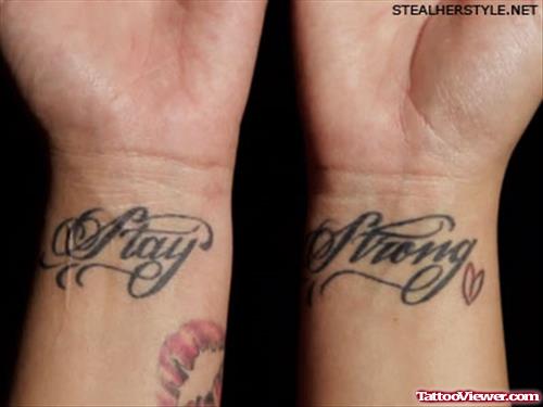 Stay Strong Feather Tattoo On Wrist