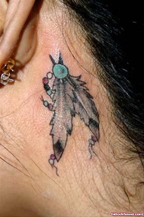Grey Ink Feathers Tattoos Behind The Ear