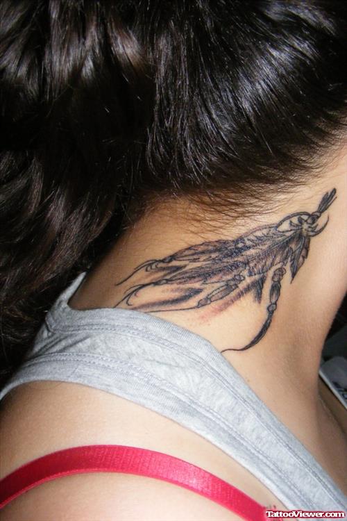 Grey Ink Feather Tattoo On Neck