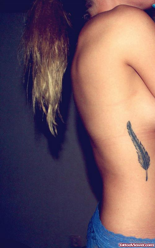 Fantastic Rib Feather Tattoo For Girls