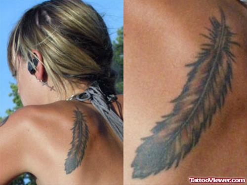 Awesome Grey Ink Feather Tattoo On Left BAck Shoulder