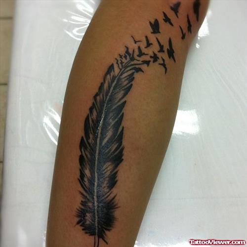 Amazing Birds Flying From Feather Tattoo