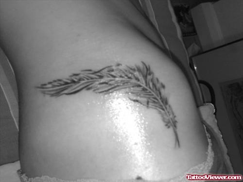 Grey Single Feather Tattoo