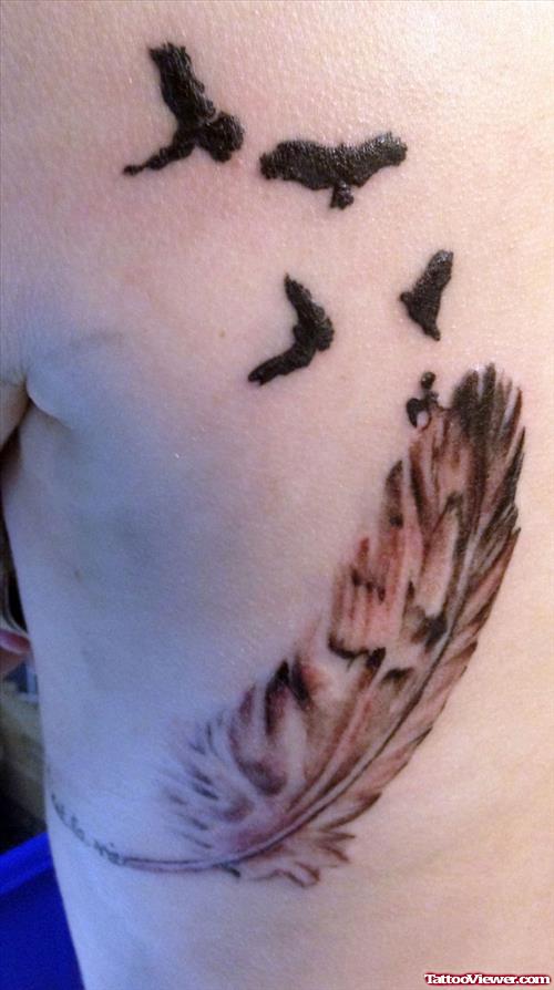 Flying Birds And Feather Tattoo On Rib