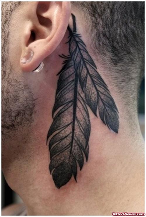 Native Feathers Grey Ink Tattoo Behind Ear