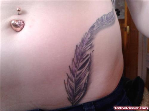 Large Grey Ink Feather Tattoo On Hip