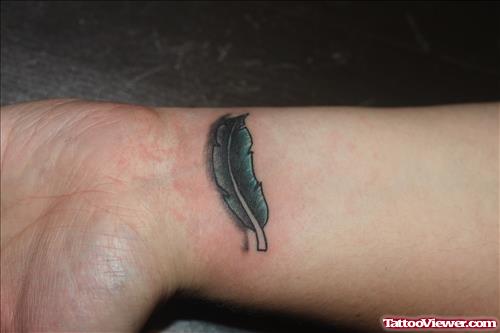Small Feather Tattoo On wrist