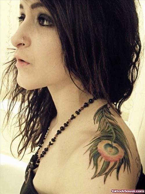 Girl With Peacock Feather Tattoo On Left SHoulder
