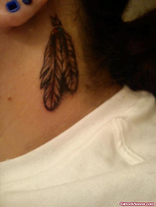 Feathers Tattoos Below Ear