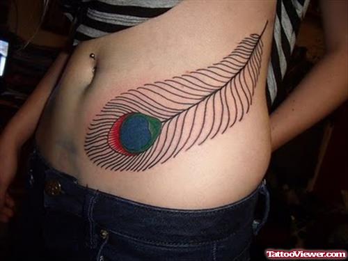 Colorful Peacock Feather Tattoo On Rib