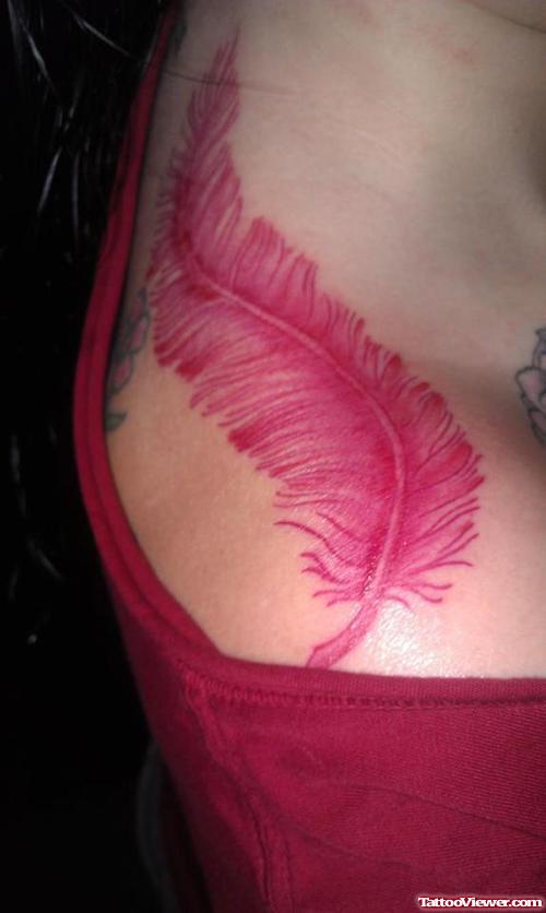 Red Feather Tattoo On Upperback