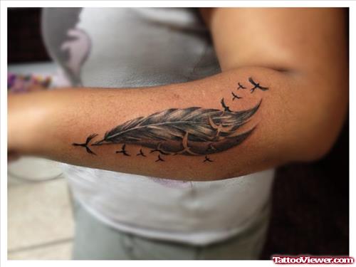 Beautiful Left Arm Feather Tattoo