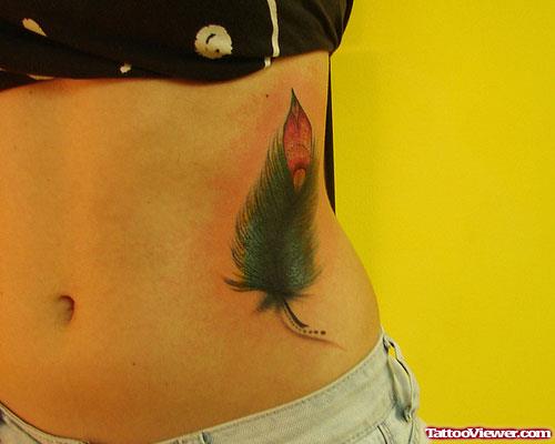 Rib Feather Tattoo For Girls
