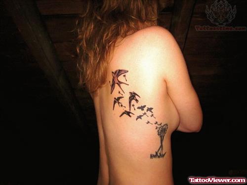 Girl With Feather And Flying Birds Rib Side Tattoo