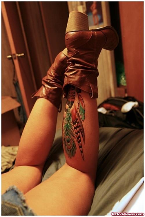 Feather Tattoo On Girl Right Arm