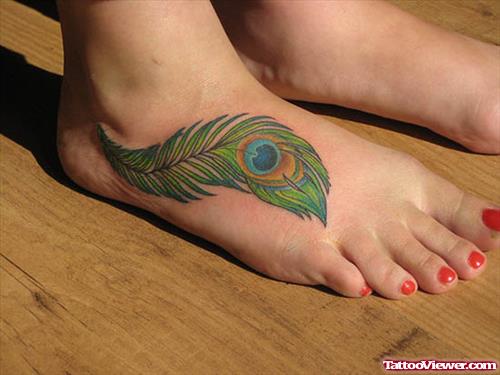 Beautiful Colored Peacock Feather Tattoo On Right Foot