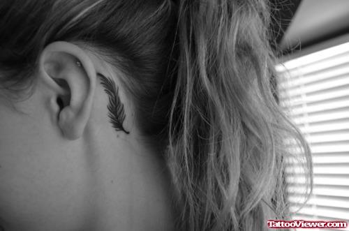 Small Feather Tattoo Below Ear