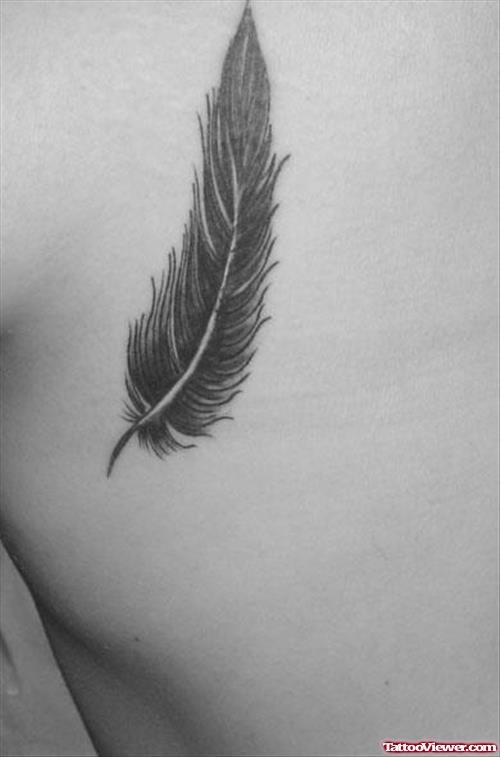 Rib Grey Ink Feather Tattoo