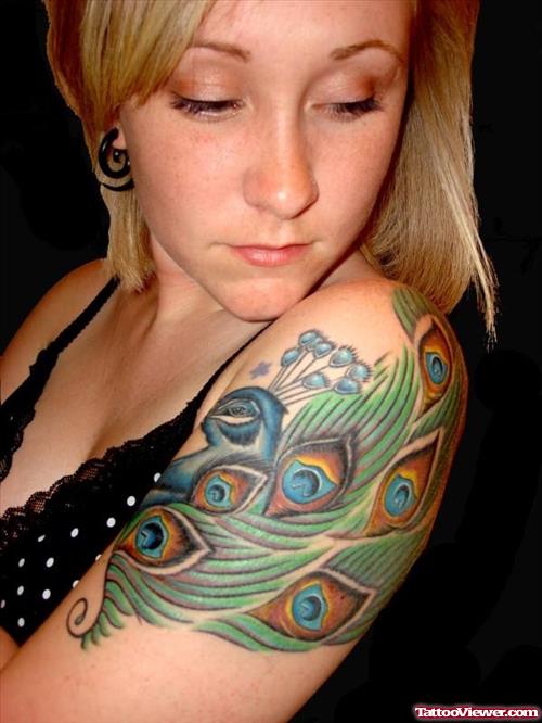 Peacock Feather Tattoo On Girl Left Shoulder