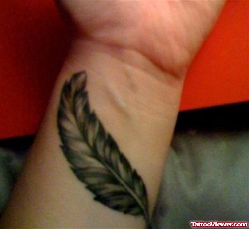 Feather Tattoo On Left Wrist