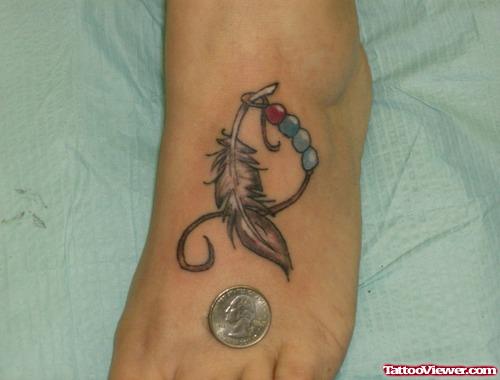 Feather Left Foot Tattoo