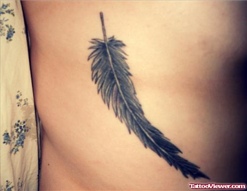 Amazing Rib Side Feather Tattoo