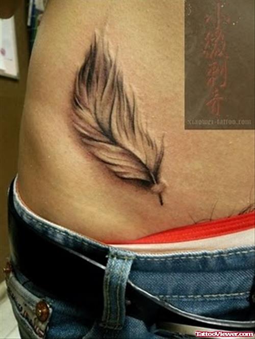 Hip Feather Tattoo