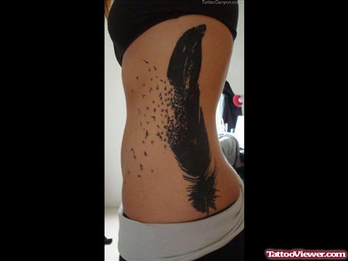 Rib Feather Tattoo