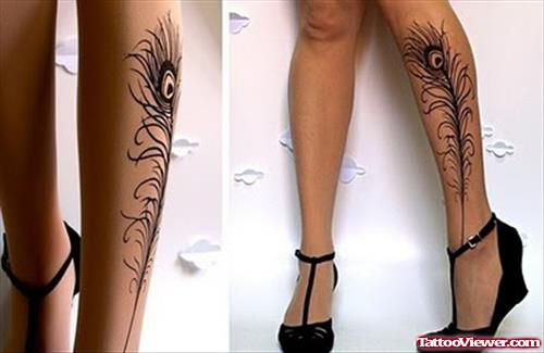Peacock Feather Tattoo On Girl Left Leg
