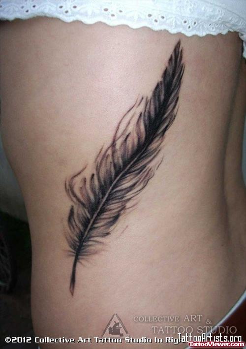 Grey Ink Feather Tattoo On Girl Side Rib
