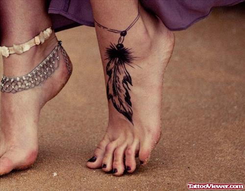 Awesome Feather Tattoos On Girl Left Foot