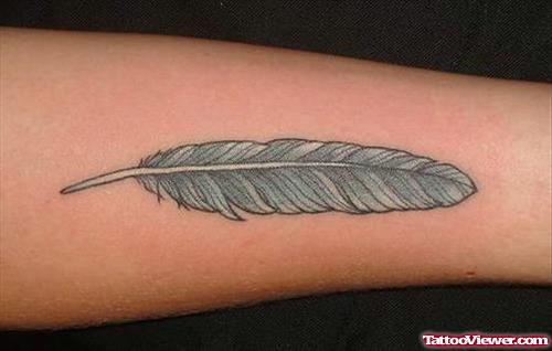 Grey Ink Feather Arm Tattoo