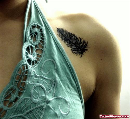 Feather Tattoo On Girl Left Shoulder