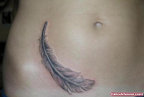 Feather Grey Ink Tattoo On Hip