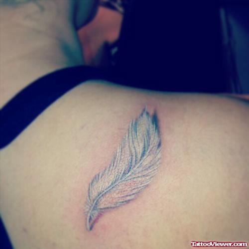 Awesome Shoulder Feather Tattoo