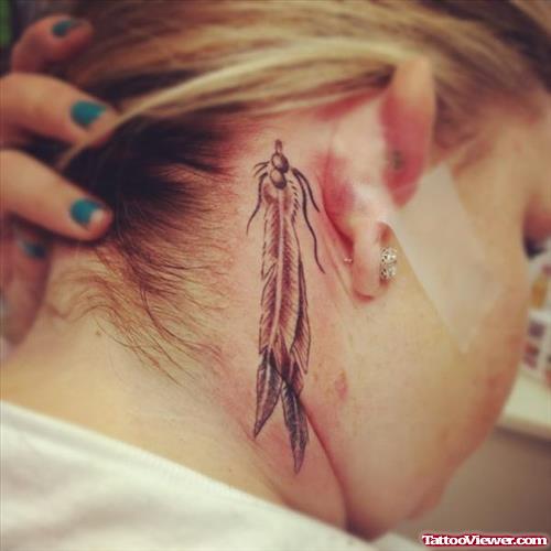 Grey Ink Feather Tattoos Behind Ear