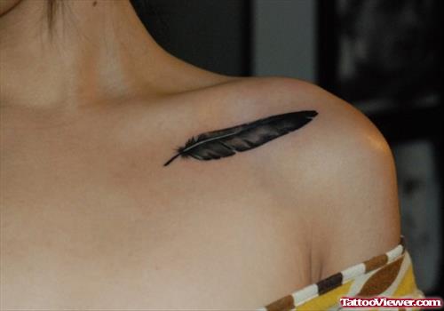 Bird Feather Tattoo On Girl Left Collarbone