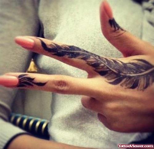 Awesome Finger Feather Tattoo