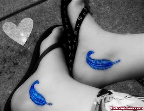 Blue Ink Feather Tattoos On Ankle