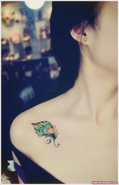Beautiful Feather Tattoo On Collarbone